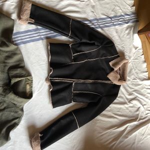 Seventeen, black leather jacket